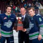 The Thunderbirds&rsquo; Mathew Barzal (13) and Scott Eansor (8) join Richard Doerksen, vice president of hockey for the WHL, at center ice with the Western Conference Championship Cup Sunday at Prospera Place in Kelowna, British Columbia. COURTEST PHOTO, Marissa Baecker/Shoot the Breeze