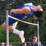 The Lions&rsquo; Benjamin Mose climbs a season-best 6-4 to finish second in the high jump. RACHEL CIAMPI, Auburn Reporter