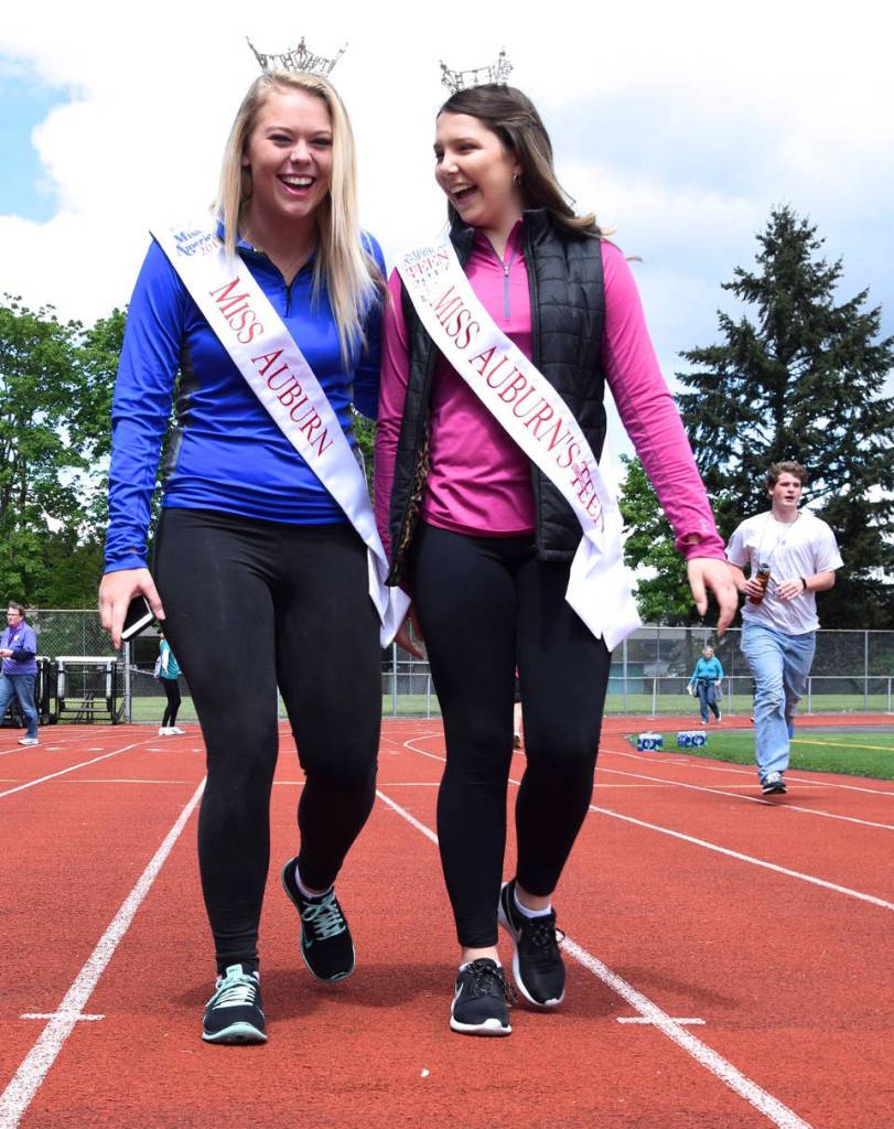 Miss Auburn Heather Haggin, left, and Miss Auburn&rsquo;s Outstanding Teen Elizabeth Enz join the walk. RACHEL CIAMPI, Reporter