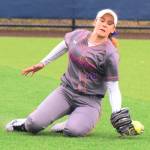 Auburn Mountainview&rsquo;s Caitlyn Rhoades reaches to make a difficult catch in right field during the fifth inning of the NPSL title game Saturday at Tahoma High School. RACHEL CIAMPI, Auburn Reporter