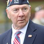 Bill Peloza, of VFW Post 1741, mingles with the crowd prior to the ceremony. MARK KLAAS, Auburn Reporter