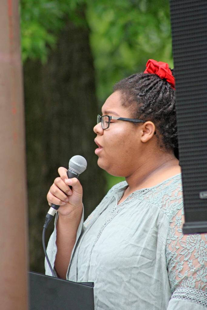 Marissa Bonner sings the national anthem. MARK KLAAS, Auburn Reporter