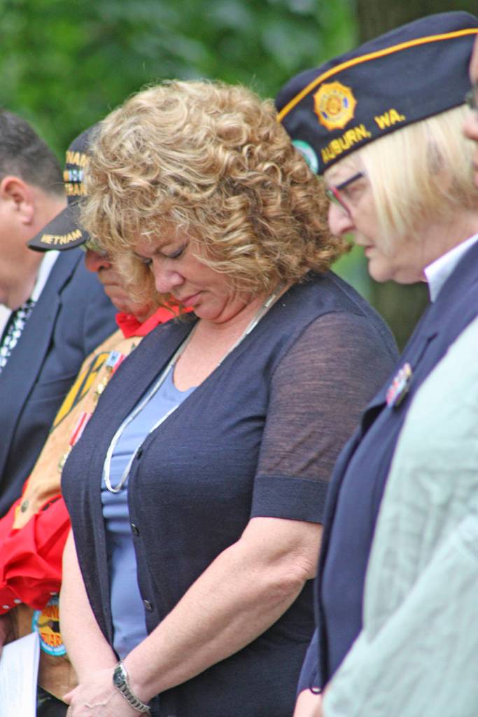 Mayor Nancy Backus joins others in prayer. MARK KLAAS, Auburn Reporter