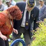 Roxane Hodges, vice regent, Lakota Chaptor for Daughters of the American Revolution, places a wreath. MARK KLAAS, Auburn Reporteer