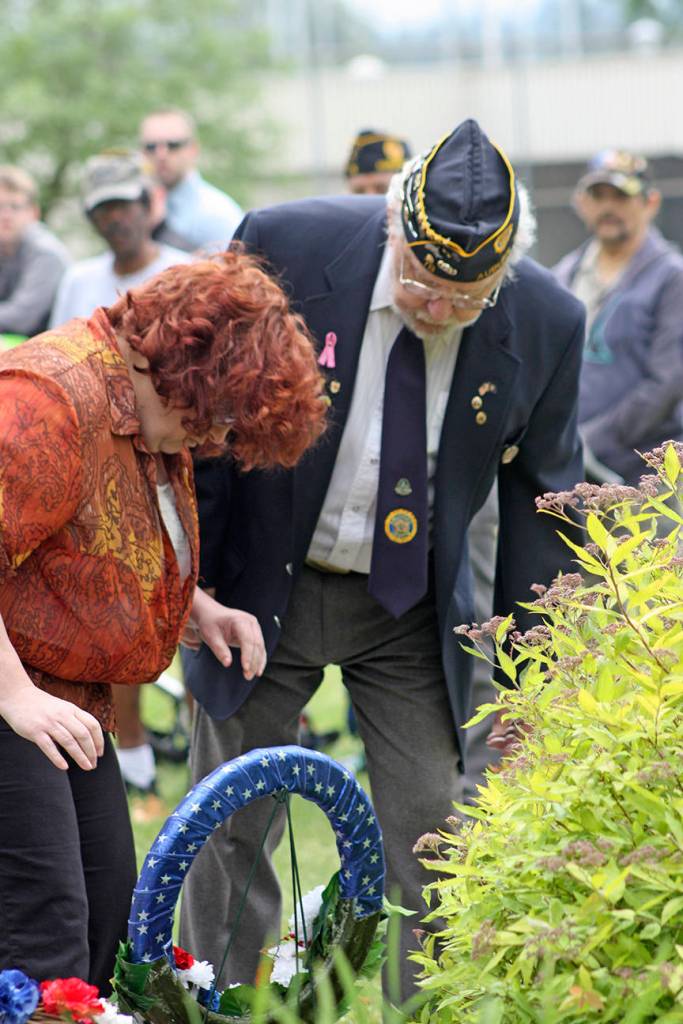 Roxane Hodges, vice regent, Lakota Chaptor for Daughters of the American Revolution, places a wreath. MARK KLAAS, Auburn Reporteer