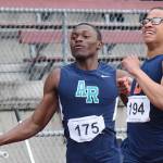 Auburn Riverside&rsquo;s Jaden Robinson takes second in the 200 meters (22.24 seconds) and 100 (11.04), both won by Decatur&rsquo;s Kemuel Santana, right. RACHEL CIAMPI, Auburn Reporter