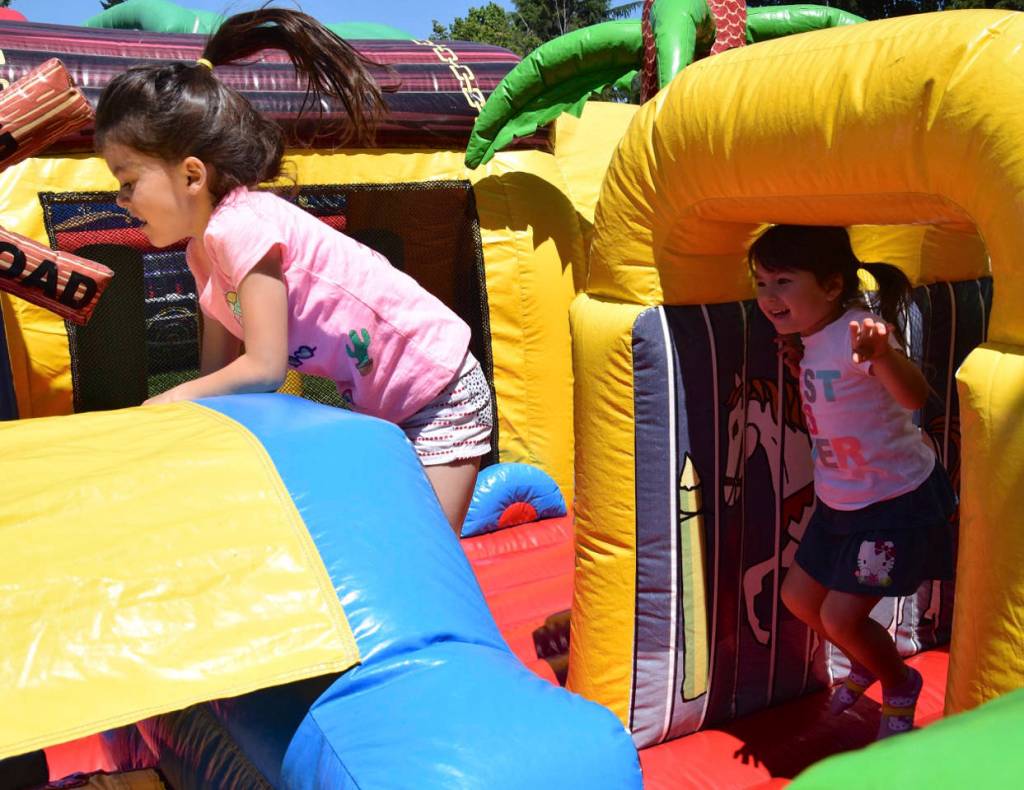 Kids play on the inflatable. RACHEL CIAMPI, Auburn Reporter