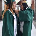 Leetah Jerry helps Catriana Juarez. RACHEL CIAMPI, Auburn Reporter