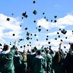 Auburn High School seniors toss their caps at the completion of graduation ceremonies. RACHEL CIAMPI, Auburn Reporter