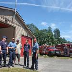 Mountain View Fire & Rescue personnel and volunteers gather in front of remodeled Fire Station 97 during an open house Sunday. MARK KLAAS, Auburn Reporter
