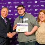 Hunter Kwartin receives the Kansas State University Legacy Scholarship Award from the KSU School of Engineering. With Kwartin is his mother, Lara, and a K-State dean of engineering. COURTESY PHOTO