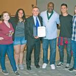 At the presentation are, from left: Thomas Jefferson students Cassie Lee and Haylee Pollard; King County Councilmember Pete von Reichbauer; Jefferson coach and MLK Medal recipient Joseph Townsend; and students Mason DeLaCruz and Avery Cantino-Kennedy. COURTESY PHOTO