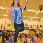 As part of Pioneer Elementary School&rsquo;s Demonstration Team, 9-year-old Emily Helms shows off her stilt-walking prowess, honed to a fine art under the guidance of P.E. teacher Michael McKinley. ROBERT WHALE, Auburn Reporter
