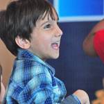 Nabeel Shetab, 4, smiles while stepping to the music during Saturday&rsquo;s concert at the Auburn Library. MARK KLAAS, Auburn Reporter