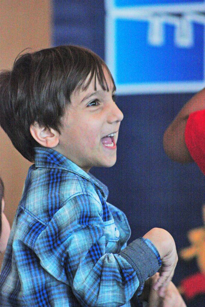 Nabeel Shetab, 4, smiles while stepping to the music during Saturday&rsquo;s concert at the Auburn Library. MARK KLAAS, Auburn Reporter