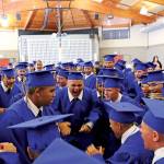 Cadet A.J. Robert of Auburn (middle left) leads a chant among the 143 cadets graduation from the Washington Youth Academy. COURTESY PHOTO