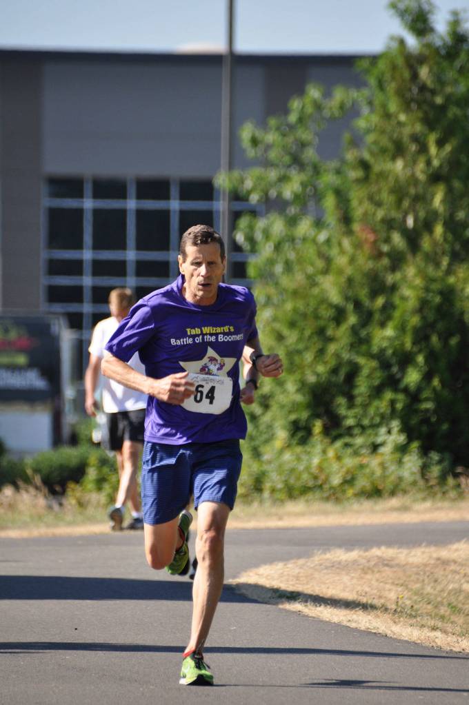Auburn’s Flannery scoots to victory in festival 5K race | PHOTOS