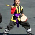 A young member of the Okinawa Kenjin-Kai Eisa Taiko group, performs. MARK KLAAS, Auburn Reporter