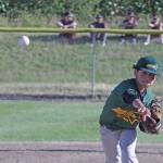 Auburn All-Star Emilio Feliciano unleashes a pitch against Federal Way National in the District 10 championship game Friday. MARK KLAAS, Auburn Reporter