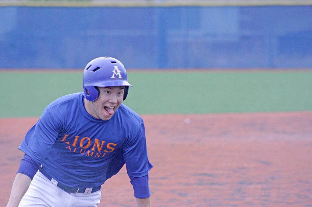 Matt Anderson charges to third base for the Lions. MARK KLAAS, Auburn Reporter