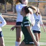 Auburn Riverside sophomore midfielder Olivia Boulet heads the ball during NPSL play against Auburn on the Ravens&rsquo; pitch Friday evening. RACHEL CIAMPI, Auburn Reporter