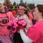 Auburn students, from left, Hailey Browne, Kaylee McCarthy and Callie Arnott dance to the music at the pre-game tailgate event. MARK KLAAS, Auburn Reporter