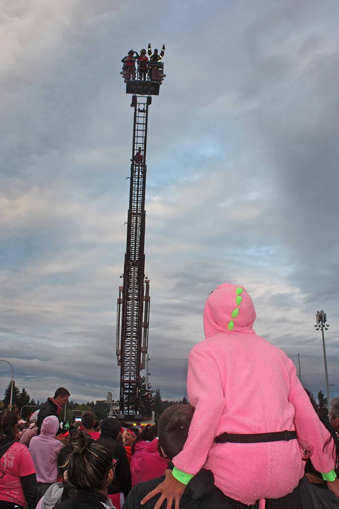 Students gaze up at the VRFA bucket ladder truck. MARK KLAAS, Auburn Reporter