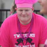 Auburn student Jayce Syslo helps man a food table and serve customers during the tailgate party Friday. MARK KLAAS, Auburn Reporter