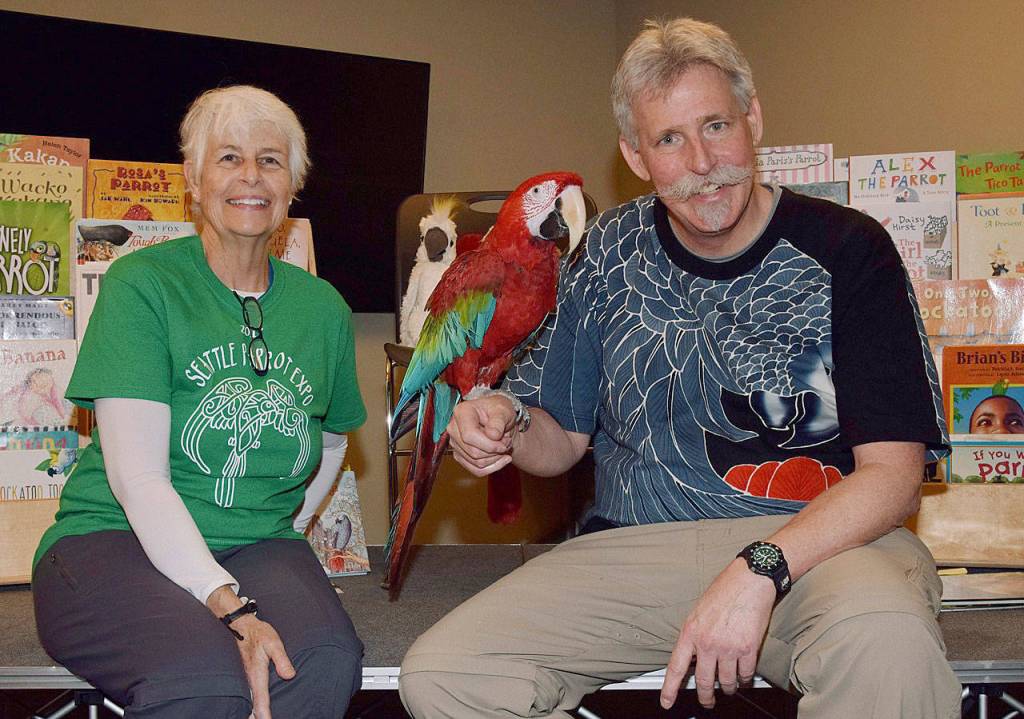 Jean Lix and Russ Campbell present their parrot, Molly. RACHEL CIAMPI, Auburn Reporter