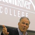 Gov. Jay Inslee talks to a Green River College student during his visit to the Auburn campus last week to discuss climate change. MARK KLAAS, Auburn Reporter