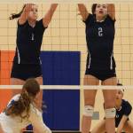 Auburn Riverside&rsquo;s Anna Maracich, left, and Calley Heilborn apply a wall to block a shot during NPSL Olympic Division play against Auburn Mountainview on Monday night. RACHEL CIAMPI, Auburn Reporter