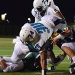 Auburn Riverside&rsquo;s Sam Braboy dives to score one his four touchdowns against Auburn during NPSL Olympic Division play Friday night. RACHEL CIAMPI, Auburn Reporter