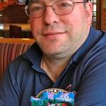 Rob Lewis, U.S. Navy veteran, shows the patch that symbolizes the newest Virginia class submarine, the USS Washington (SSN 787), commissioned on Oct. 7. The patch includes imagery of Northwest and Native American culture and art. MARK KLAAS, Auburn Reporter