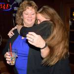 Auburn Mayor Nancy Backus receives a congratulatory hug from her daughter, Lucky, at an election-night campaign gathering at The Longhorn Barbecue on Tuesday. Backus jumped out to a big lead over challenger Largo Wales from early returns. RACHEL CIAMPI, Auburn Reporter