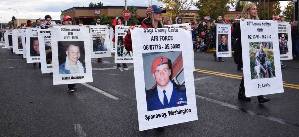 Gold Star Mothers with banners of the fallen. RACHEL CIAMPI, Auburn Reporter