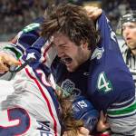 Thunderbirds enforcer Turner Ottenbreit scuffles with the Americans Nolan Yaremko during WHL play Friday night at the accesso ShoWare Center. COURTESY PHOTO, Brian Liesse/T-Birds