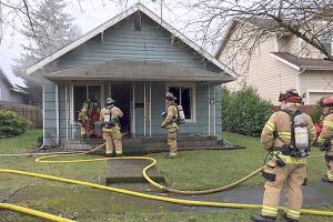 Neighbor spots smoke on roof and calls 911; VRFA douses fire