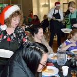 Mayor Nancy Backus and volunteer elves serve up breakfast. RACHEL CIAMPI, Auburn Reporter