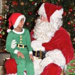 Aarav Pillay, 6, tells Santa what he wants for Christmas. RACHEL CIAMPI, Auburn Reporter