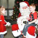 Twins Olivia and Luke Lebhart, 5, above, tell St. Nick what they want for Christmas. RACHEL CIAMPI, Auburn Reporter