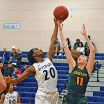 Auburns Emily Strojan, right, battles Auburn Riversides Stephanie Igwala for the rebound during NPSL Olympic play Thursday night. RACHEL CIAMPI, Auburn Reporter