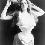 A late 1800s beauty models a corset of the time, designed to push up her breasts, cinch in the waist, and accentuate the backwards flare of her derriere. COURTESY PHOTO, WRVM