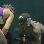 The Ravens Yusef Nelson, right, scored an 18-7 decision over Highlines Kevin Plenh Romero in the 120-pound final and was chosen the tournaments most outstanding lightweight. MARK KLAAS, Auburn Reporter