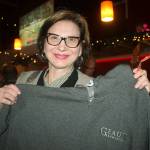 Taryn Hornby shows the Geaux Brewery Hoody she won at a raffle during a benefit program last week to support the Heritage Building fire victims. ROBERT WHALE, Auburn Reporter