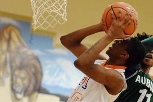 Trojans down Lions 53-47