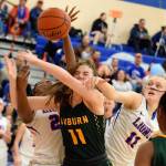 Auburn Mountainviews Azaria Johnson, left, and Jenna Lacey, right, battle Auburns Emily Strojan for the ball during their NPSL Olympic Division game Tuesday. RACHEL CIAMPI, Auburn Reporter