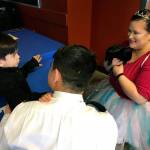 Lascey Tuppa, the tooth fairy, introduces Lily, White River Family Dentistrys mascot bunny, to Lincoln Barnes, 4, as his father, Bruce, watches. MARK KLAAS, Auburn Reporter