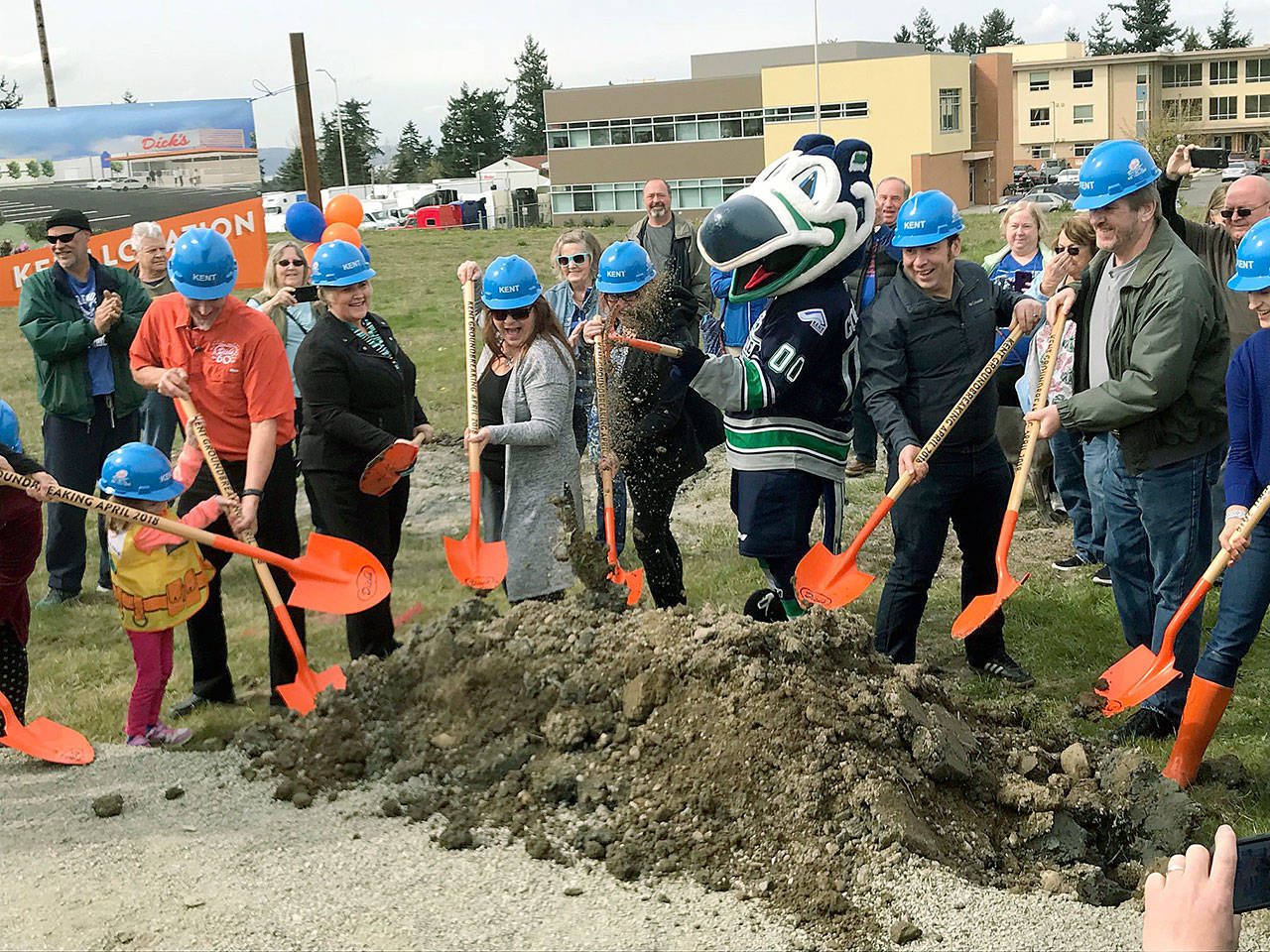 City leaders joined Dicks Drive-In owners, employees and customers, and Cool Bird, the Thunderbirds mascot, for an official groundbreaking ceremony on Tuesday for the new restaurant off Pacific Highway South on Kents West Hill. MARK KLAAS, Kent Reporter