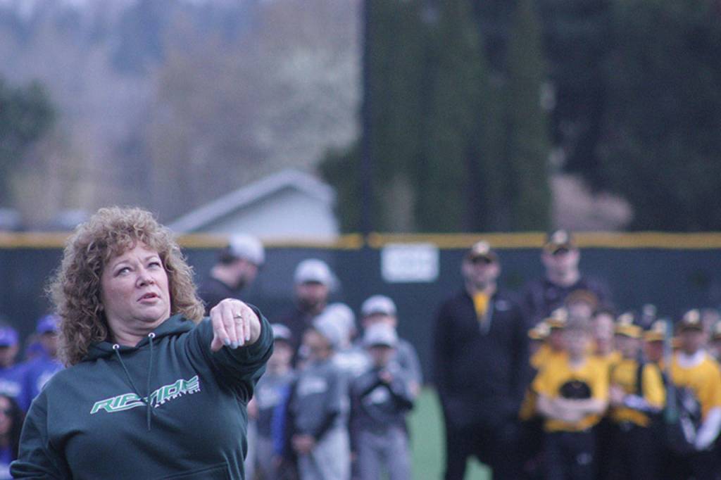 Mayor Nancy Backus, a lefty, throws out the ceremonial first pitch. MARK KLAAS, Auburn Reporter