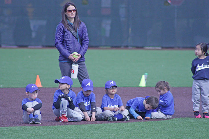 Teams wait patiently for the opening ceremonies. MARK KLAAS, Auburn Reporter